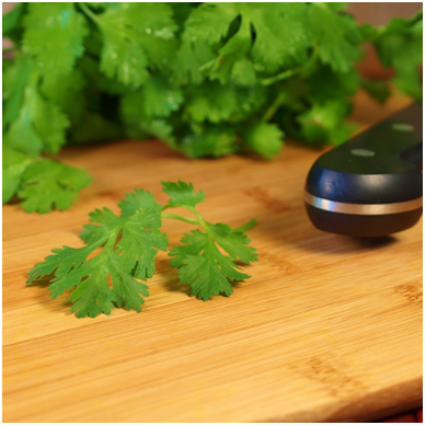 Cilantro or Chinese parsley.  When selecting cilantro for your dish, look for bright green leaves free of discoloration or spots.  Wash the cilantro well under cold running water, drain, cut off the stems and then give it a coarse chop